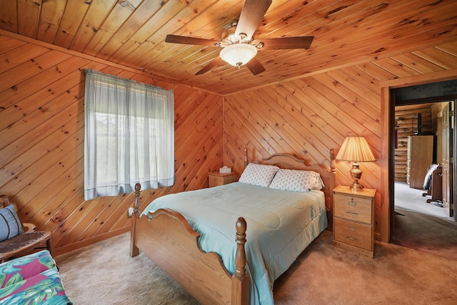 23 Mccutcheon Way, Sidney, ME 04330 - bedroom with wood ceiling, carpet floors, wood walls, and a ceiling fan