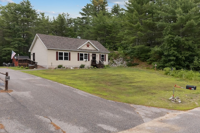 504 Balch Mill Rd, Newfield, ME 04095 - single story home featuring a front yard and roof with shingles