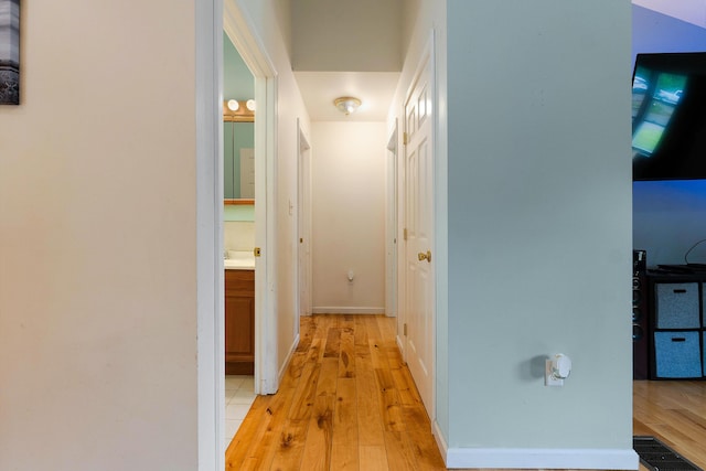 504 Balch Mill Rd, Newfield, ME 04095 - corridor with light wood finished floors