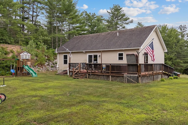 504 Balch Mill Rd, Newfield, ME 04095 - rear view of house featuring a shingled roof, a lawn, and a deck