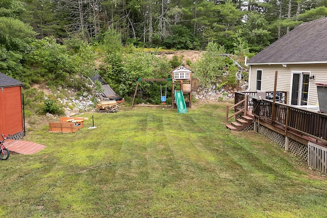 504 Balch Mill Rd, Newfield, ME 04095 - view of grassy yard featuring a playground and a deck