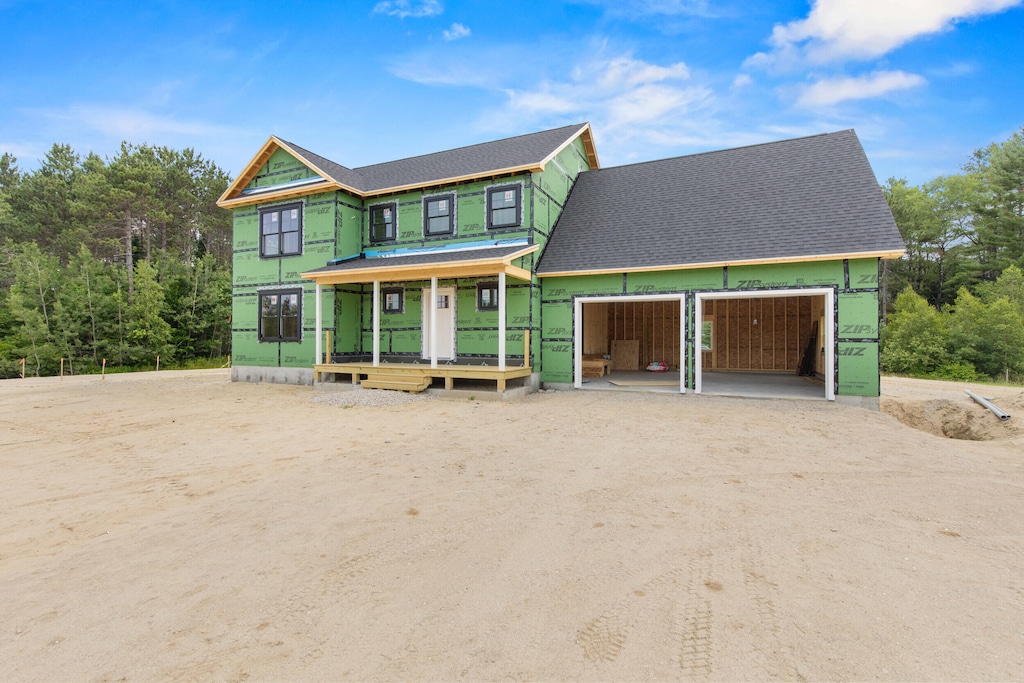 256 Pinkham Brook Rd, Durham, ME 04222 - property in mid-construction with covered porch, driveway, a garage, and a shingled roof