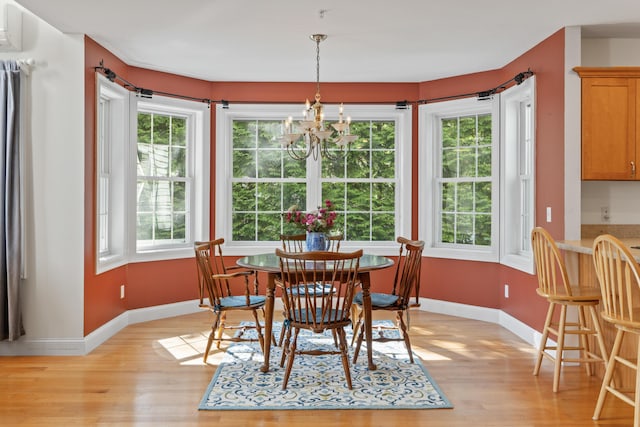 17 Tuttle Ln, Wells, ME 04090 - dining room with light wood-style flooring and a chandelier