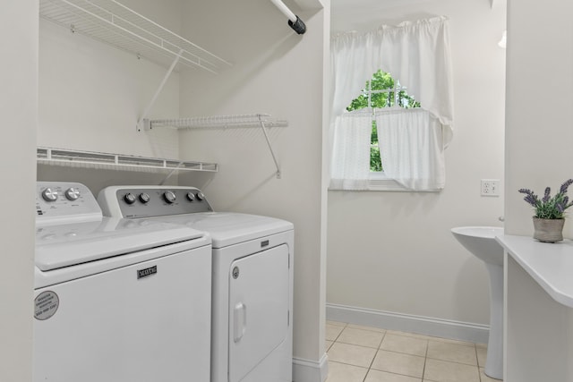 17 Tuttle Ln, Wells, ME 04090 - washroom with separate washer and dryer and light tile patterned floors