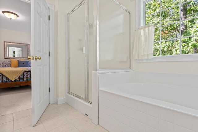 17 Tuttle Ln, Wells, ME 04090 - ensuite bathroom featuring a stall shower, a garden tub, healthy amount of natural light, and tile patterned floors