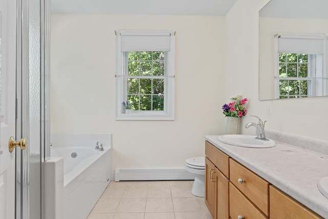 17 Tuttle Ln, Wells, ME 04090 - full bathroom with baseboard heating, plenty of natural light, tile patterned floors, and double vanity