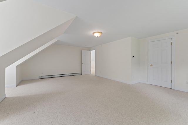 17 Tuttle Ln, Wells, ME 04090 - bonus room featuring baseboard heating, light carpet, and vaulted ceiling
