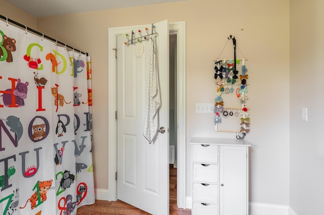 123 Lasalle Dr, Bangor, ME 04401 - full bathroom with wood finished floors and a shower with curtain