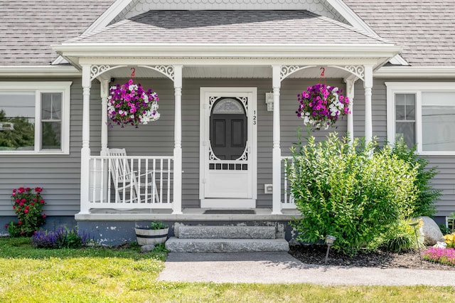123 Lasalle Dr, Bangor, ME 04401 - entrance to property featuring a porch and a shingled roof