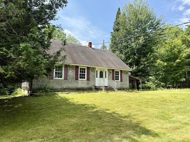 1606 Avenue Rd, Exeter, ME 04435 - view of front of property with a front yard, a chimney, and a shingled roof