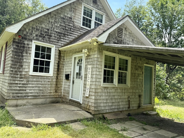 1606 Avenue Rd, Exeter, ME 04435 - rear view of property featuring a shingled roof