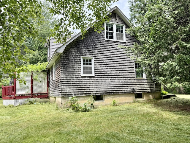 1606 Avenue Rd, Exeter, ME 04435 - view of side of property with a yard and a deck