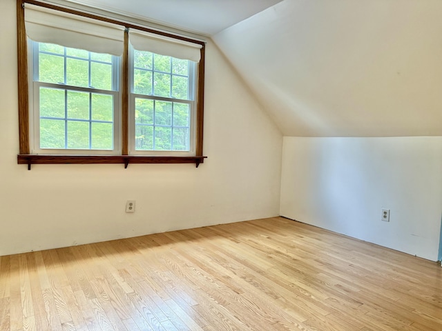 1606 Avenue Rd, Exeter, ME 04435 - additional living space featuring wood finished floors and vaulted ceiling