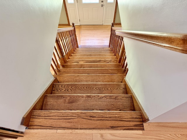 1606 Avenue Rd, Exeter, ME 04435 - stairs featuring hardwood / wood-style floors