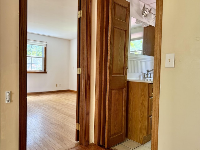 1606 Avenue Rd, Exeter, ME 04435 - hallway with light wood finished floors and baseboards