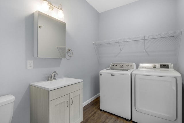 1031 Hallowell Rd, Durham, ME 04222 - washroom with independent washer and dryer and dark wood-style flooring