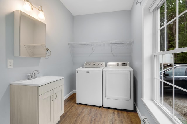1031 Hallowell Rd, Durham, ME 04222 - laundry room with light wood-style floors and washing machine and dryer