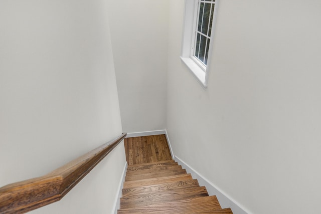 1031 Hallowell Rd, Durham, ME 04222 - stairway with wood finished floors and baseboards
