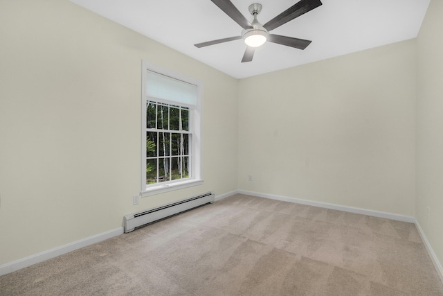 1031 Hallowell Rd, Durham, ME 04222 - unfurnished room with a baseboard heating unit, light carpet, and a ceiling fan