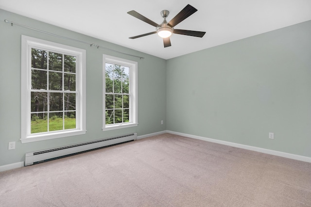 1031 Hallowell Rd, Durham, ME 04222 - carpeted empty room featuring baseboard heating and a ceiling fan