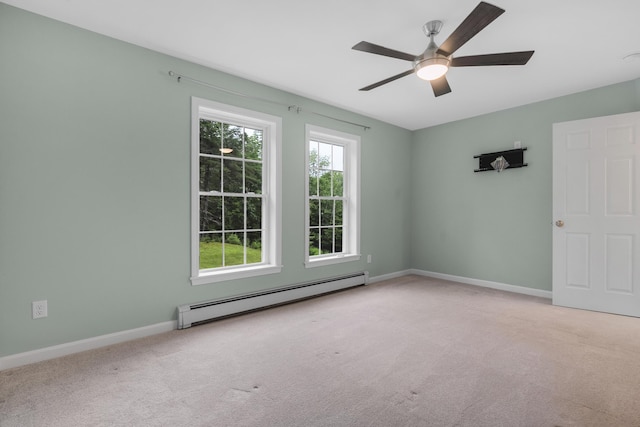 1031 Hallowell Rd, Durham, ME 04222 - unfurnished room featuring a baseboard radiator, carpet floors, and a ceiling fan