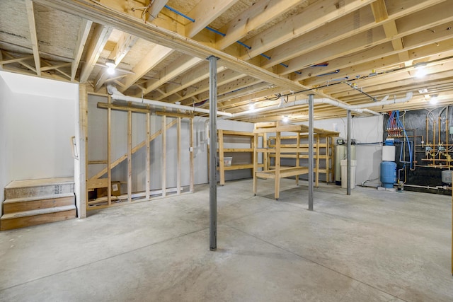 1031 Hallowell Rd, Durham, ME 04222 - unfinished basement featuring a water pressure tank