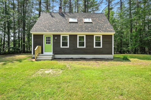 117 Badger Cir, Limerick, ME 04048 - view of front of home with a chimney, roof with shingles, and a front lawn