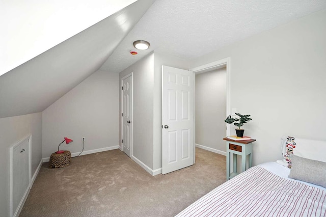 117 Badger Cir, Limerick, ME 04048 - bedroom with carpet flooring and vaulted ceiling