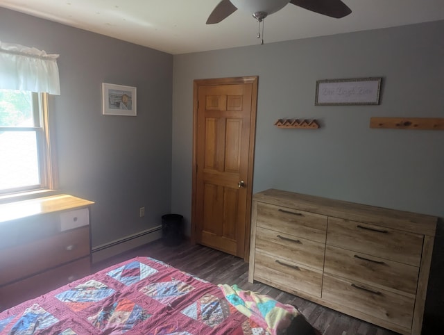 9 Deer Hill Ln, Hampden, ME 04444 - bedroom featuring a baseboard radiator, wood finished floors, and ceiling fan