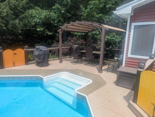 9 Deer Hill Ln, Hampden, ME 04444 - outdoor pool with a pergola, a wooden deck, and outdoor dining space