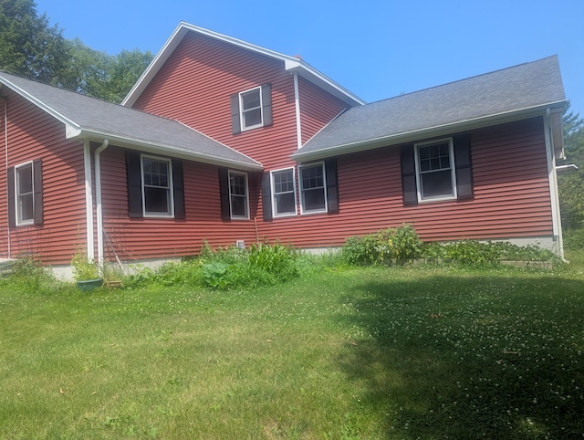 9 Deer Hill Ln, Hampden, ME 04444 - view of side of property featuring a lawn and a shingled roof