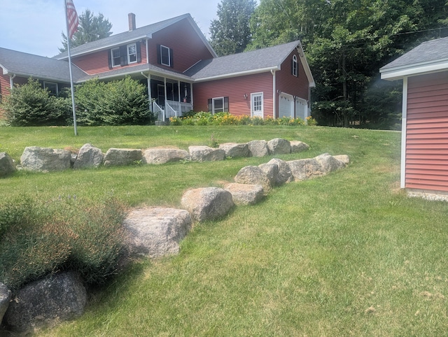 9 Deer Hill Ln, Hampden, ME 04444 - view of grassy yard featuring a garage