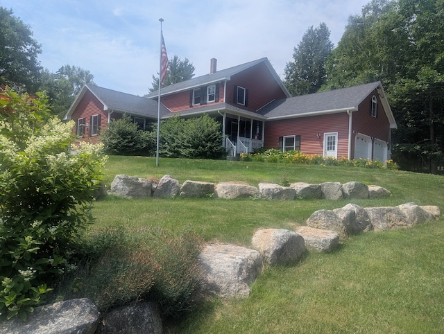 9 Deer Hill Ln, Hampden, ME 04444 - back of house featuring a yard, a garage, and a chimney