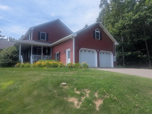 9 Deer Hill Ln, Hampden, ME 04444 - view of front facade featuring a front yard, a porch, and driveway