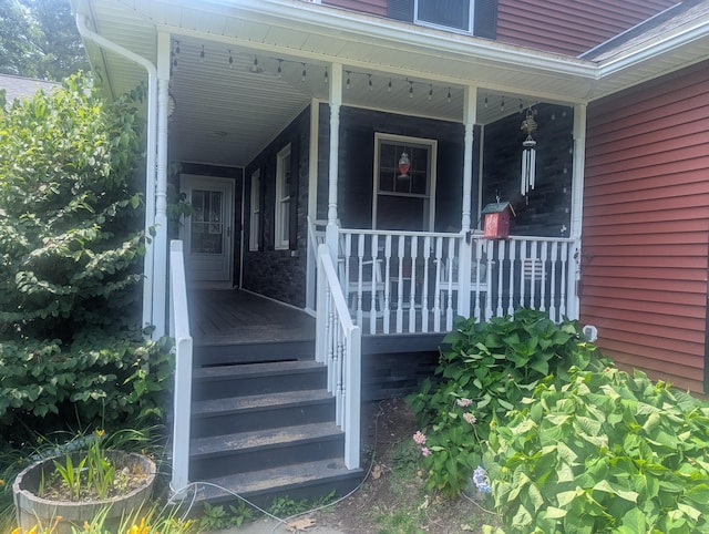 9 Deer Hill Ln, Hampden, ME 04444 - view of exterior entry with covered porch