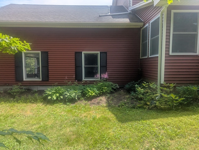 9 Deer Hill Ln, Hampden, ME 04444 - rear view of house with a lawn and roof with shingles