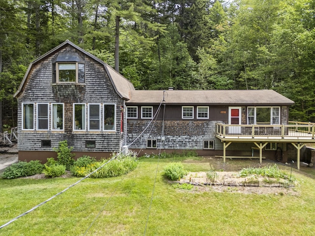490 Cross Point Rd, Edgecomb, ME 04556 - rear view of house featuring a deck, a lawn, and a gambrel roof