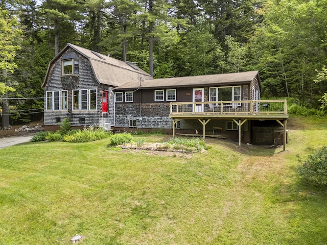 490 Cross Point Rd, Edgecomb, ME 04556 - rear view of property with a deck, a lawn, and a shingled roof
