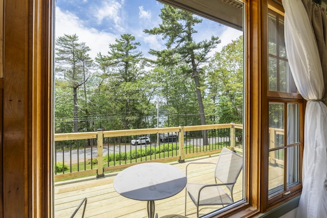 490 Cross Point Rd, Edgecomb, ME 04556 - wooden terrace with view of scattered trees