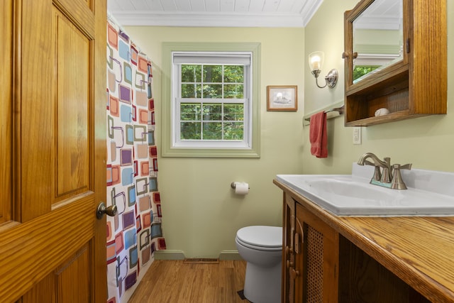 490 Cross Point Rd, Edgecomb, ME 04556 - full bathroom featuring ornamental molding, vanity, wood finished floors, and a shower with shower curtain