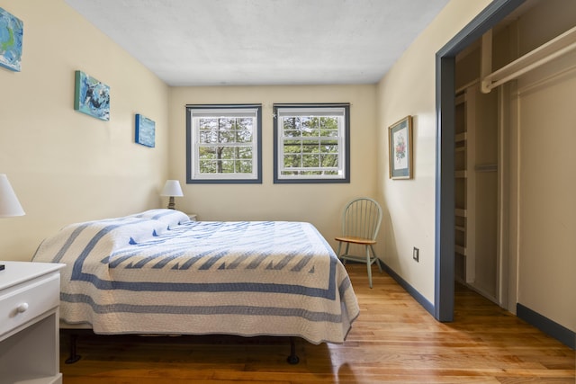 490 Cross Point Rd, Edgecomb, ME 04556 - bedroom featuring light wood finished floors