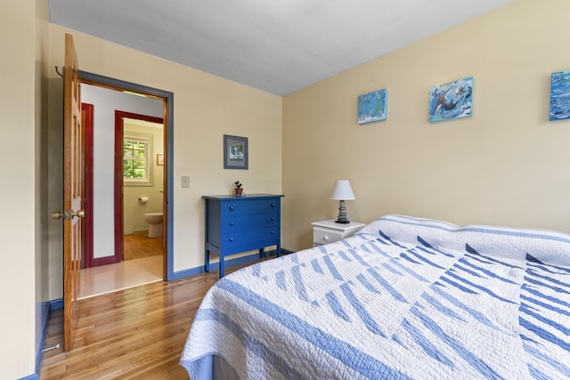 490 Cross Point Rd, Edgecomb, ME 04556 - bedroom with wood finished floors and baseboards
