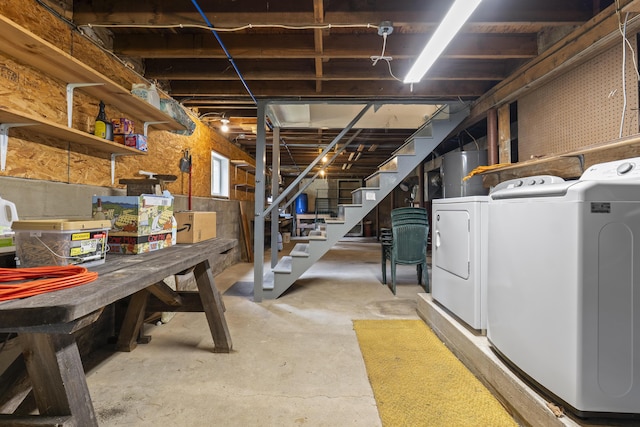 490 Cross Point Rd, Edgecomb, ME 04556 - unfinished basement with washing machine and dryer, water heater, stairway, and a workshop area