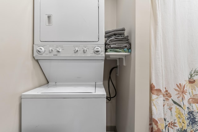 490 Cross Point Rd, Edgecomb, ME 04556 - laundry area featuring estacked washer and dryer