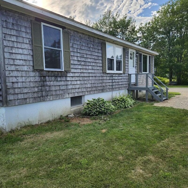 96 N Main St, Milbridge, ME 04658 - view of property exterior with a lawn