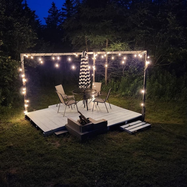 96 N Main St, Milbridge, ME 04658 - deck at twilight with a yard