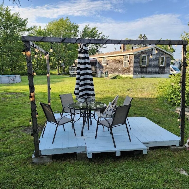 96 N Main St, Milbridge, ME 04658 - view of grassy yard with a deck