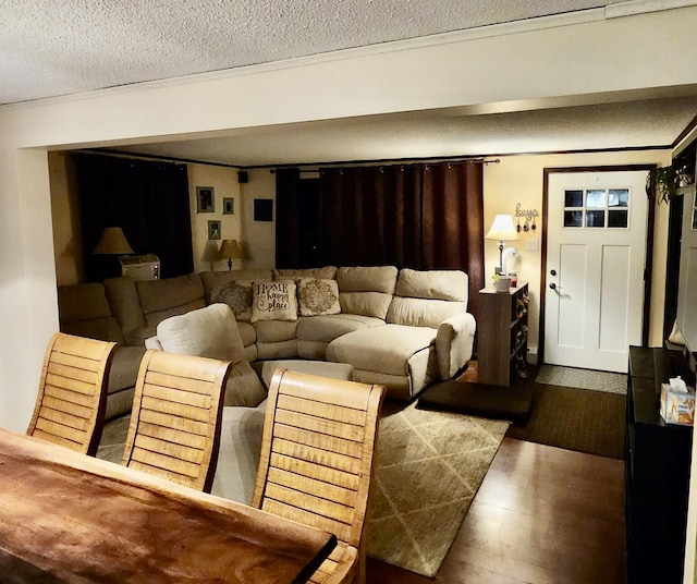 96 N Main St, Milbridge, ME 04658 - living area with wood finished floors and a textured ceiling