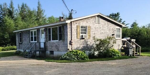 96 N Main St, Milbridge, ME 04658 - view of side of home with a chimney