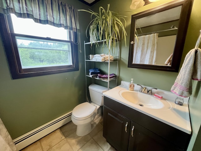 96 N Main St, Milbridge, ME 04658 - full bath with baseboard heating, vanity, a shower with curtain, and tile patterned floors
